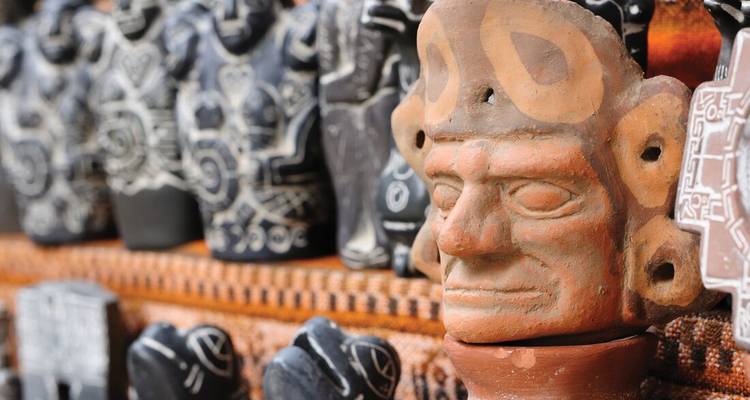 Artisan crafts with intricate designs on display.