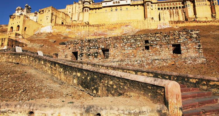Sun-drenched fort with ancient walls and walkways.
