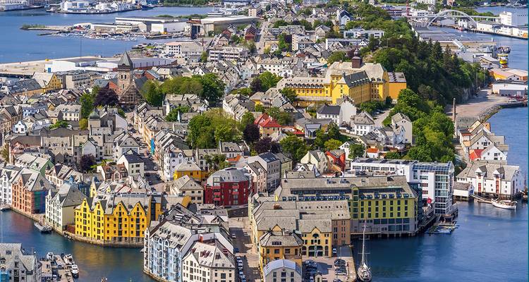 Historic city with colorful buildings by the sea.