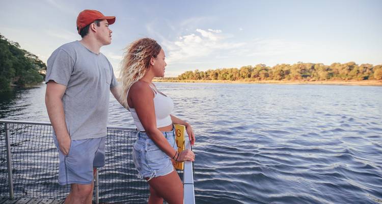 Couple on a boat enjoying the water view