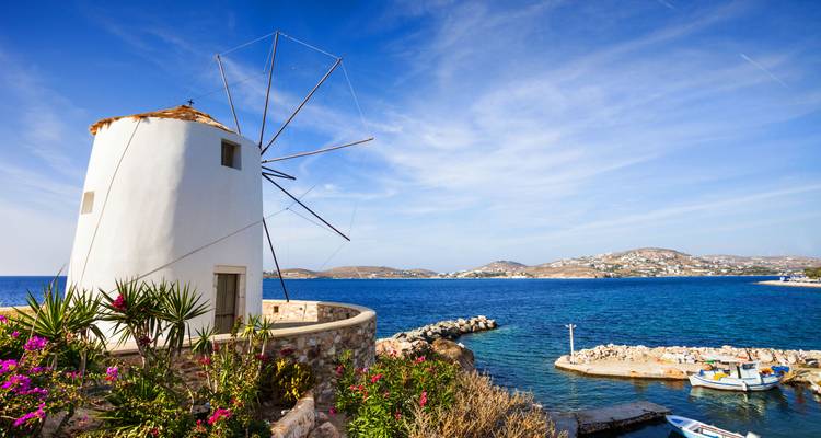 Windmill overlooking the sea coast.