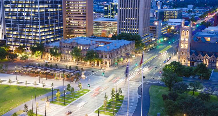 Cityscape of Adelaide at dusk with motion blur from traffic.