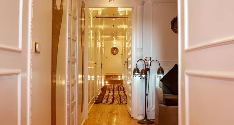 Stylish indoor corridor with ornate decor.