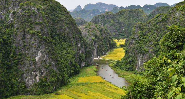 River snaking through lush green mountainous terrain.