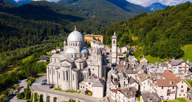 Mountainous town with a grand cathedral.