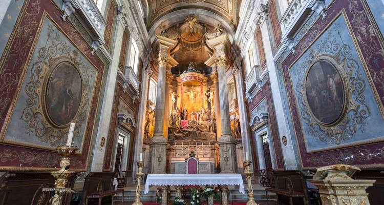 Interior of a historic church with ornate decorations.