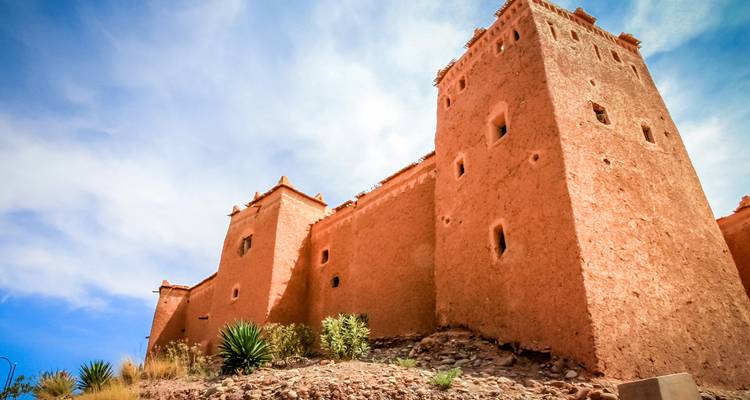 Clay fortress in a desert landscape.