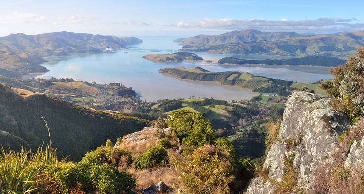 Panoramic view of a coastal landscape with bays and peninsulas.