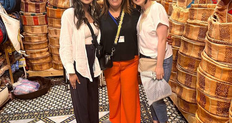 Group of people posing in a Moroccan market