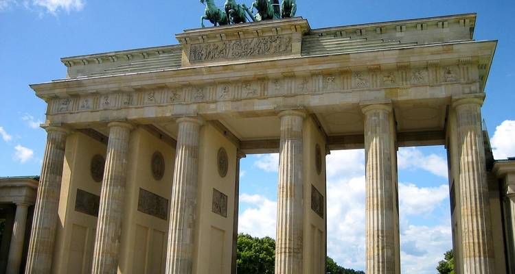 Brandenburg Gate under a clear blue sky.