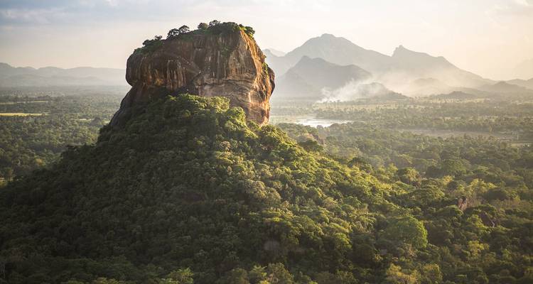 Sigiriya Rock with lush landscape in Sri Lanka.