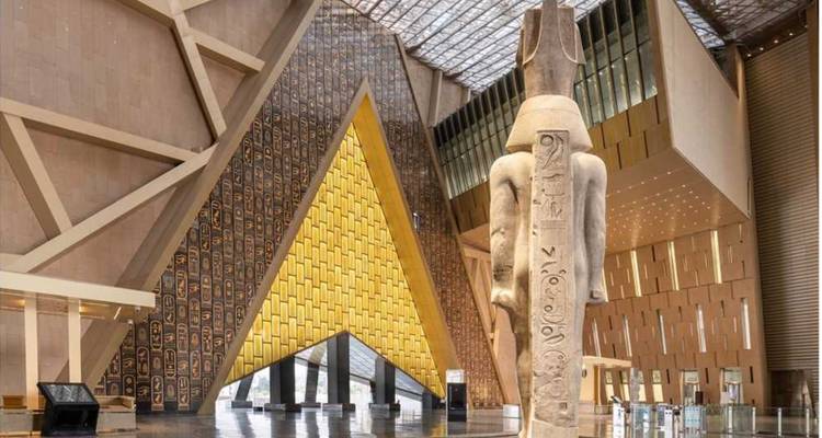 Interior of a modern museum with ancient statue