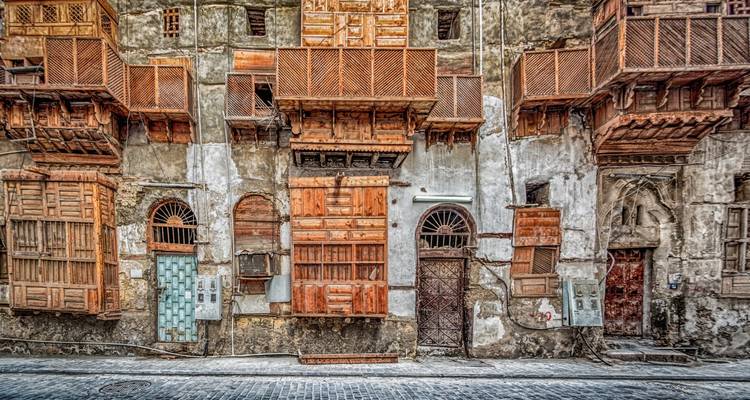 Old buildings with traditional wooden shutters.