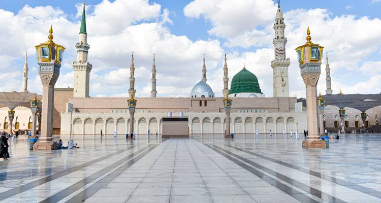 Large mosque with a clean courtyard.