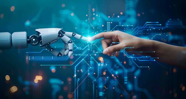Conceptual image of a robotic hand touching a human hand.