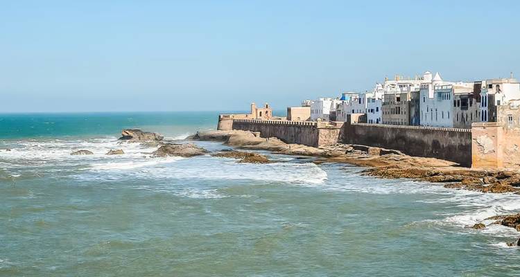 Coastline with city buildings along the shoreline.