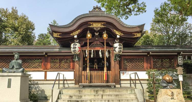 Traditional Japanese shrine with lanterns.