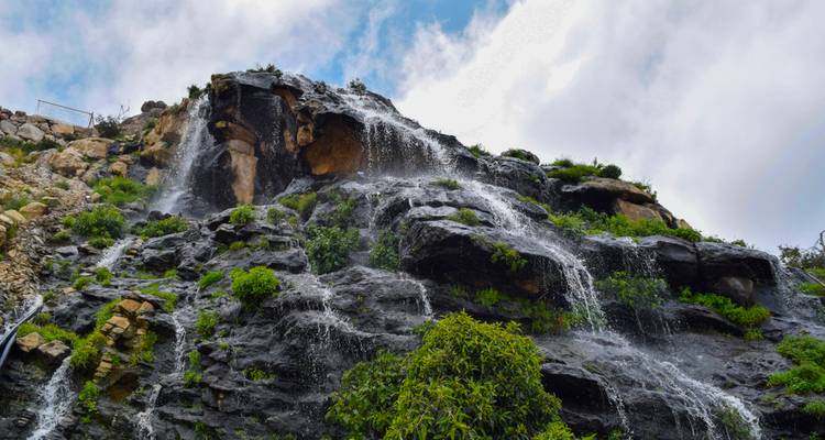 Water flowing down a rocky hillside.