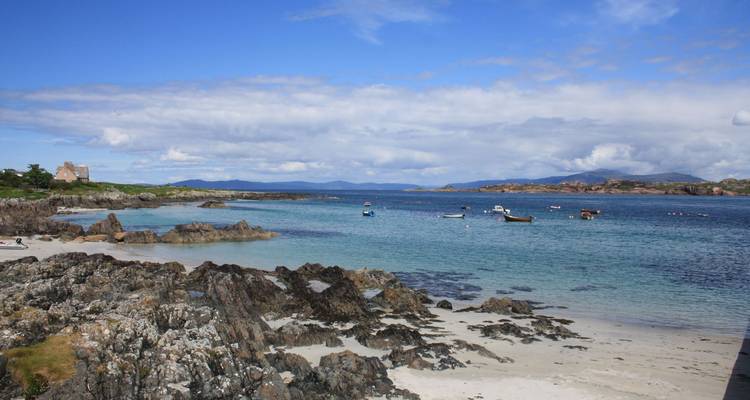 Picturesque bay with sand beaches and rocky shores.