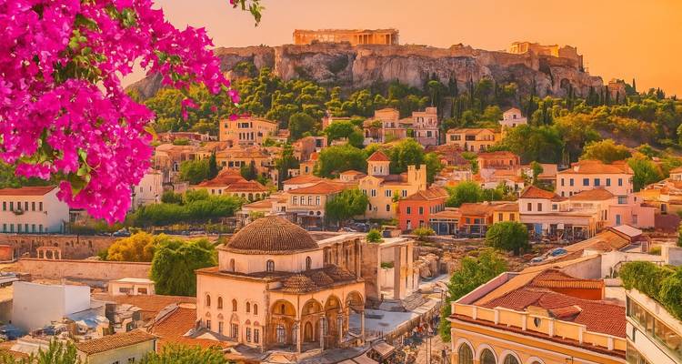 Colorful buildings in Athens with the Acropolis view.