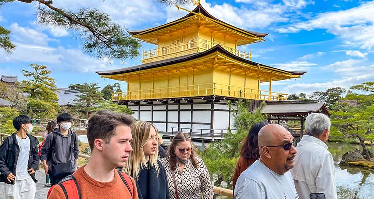 People visiting a famous golden temple.