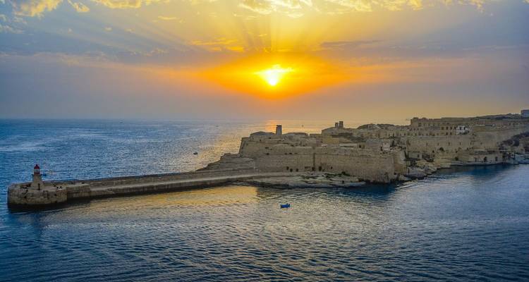 Seaside fortress at sunset.
