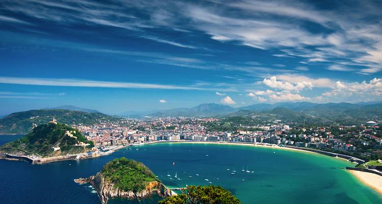 Coastal cityscape with mountains