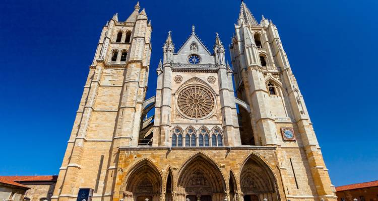A large Gothic cathedral with a prominent rose window.