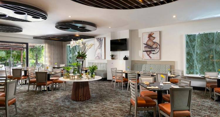 Upscale restaurant interior with modern furnishings and decor.