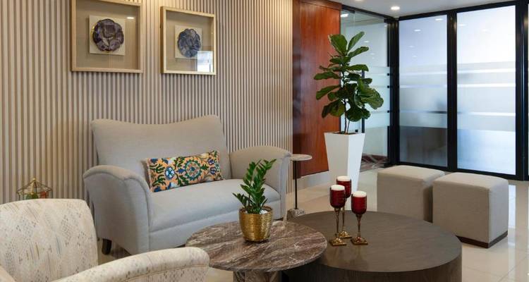 An interior lounge area with comfortable seating and decor.