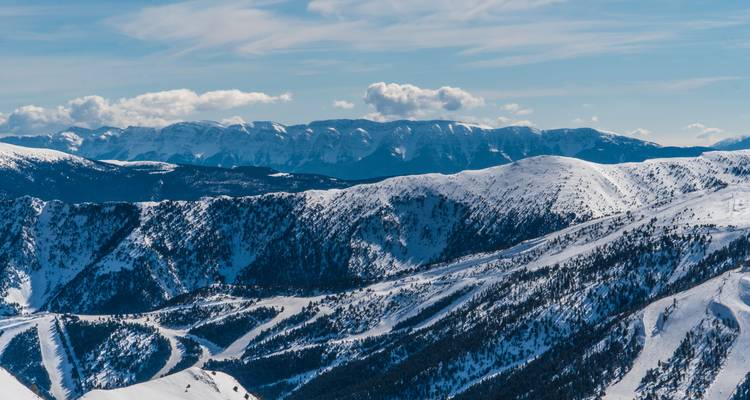 Scenic view of snow-covered mountains.