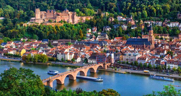 Aerial view of Heidelberg with its hilltop castle, Old Bridge and colorful old town beside the Neckar River.