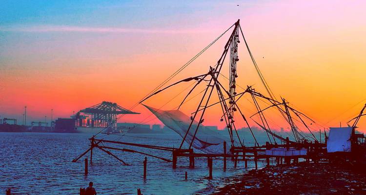 Traditional Chinese fishing nets at sunset.