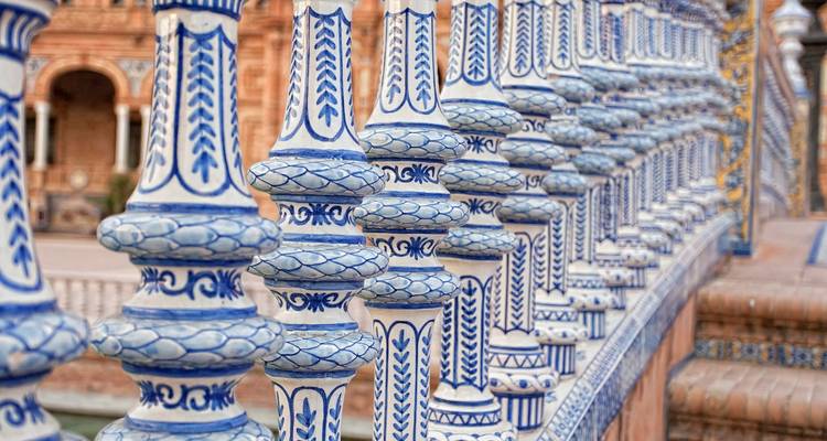 Detailed close-up of blue and white ceramic balustrades of Plaza de España.