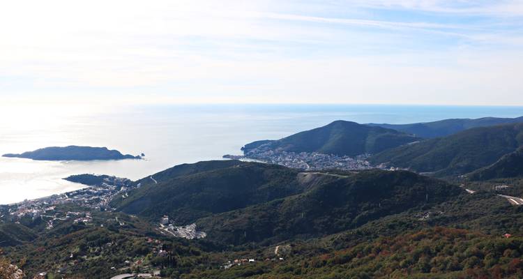 Expansive coastal panorama from a mountain vantage point overlooking Budva and nearby bays.