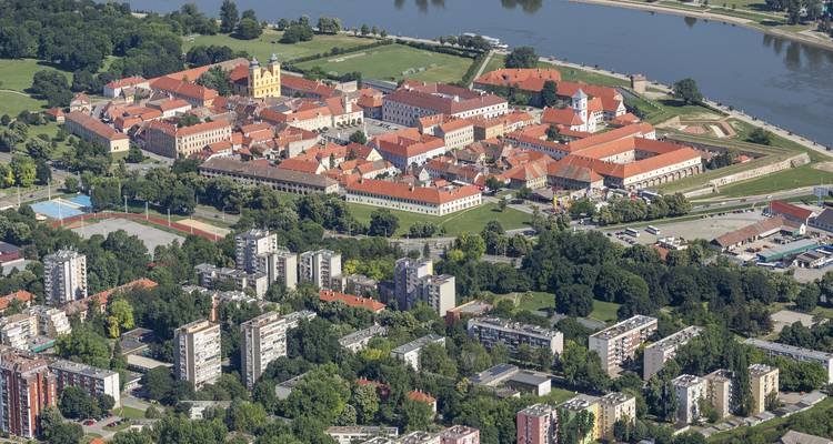 Aerial of Osijek Tvrđa fortress complex with red-tiled roofs beside Drava River