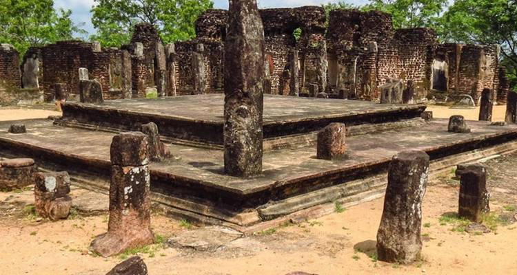 Ruins of an ancient brick platform and pillars at Polonnaruwa archaeological site