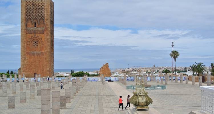 Hassan Tower and colonnade plaza overlooking Rabat skyline and sea.