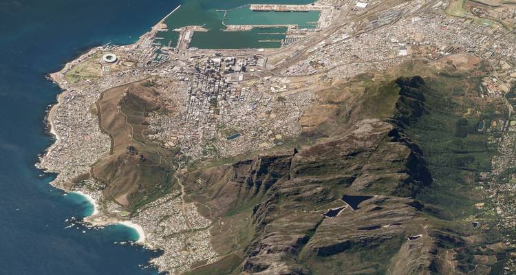High-resolution satellite view of coastal city, harbour and Table Mountain massif