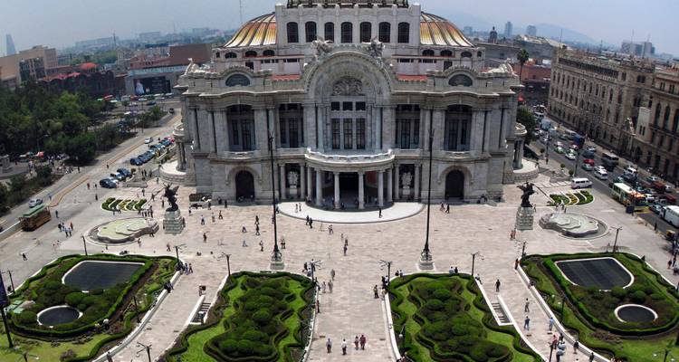 Aerial perspective of Palacio de Bellas Artes and its formal gardens in Mexico City.