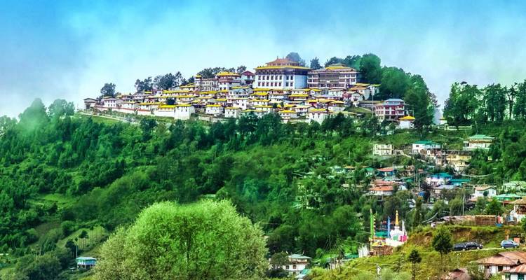Expansive view of Tawang Monastery sprawling across a green hilltop