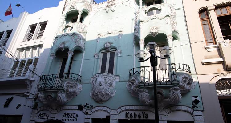 Art nouveau façade with ornate balconies and sea-green stucco in Lima’s historic centre.