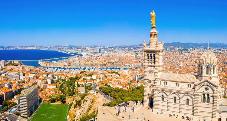 Panorama of Marseille with Notre-Dame de la Garde basilica overlooking the city and harbor