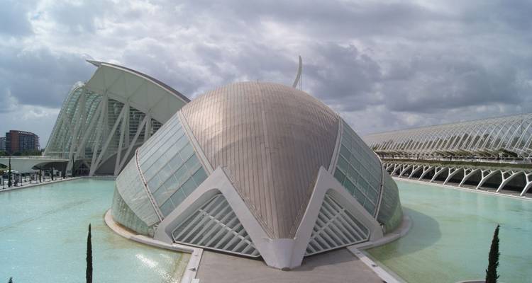 Futuristic Hemisfèric building in Valencia’s City of Arts and Sciences complex with reflecting pools