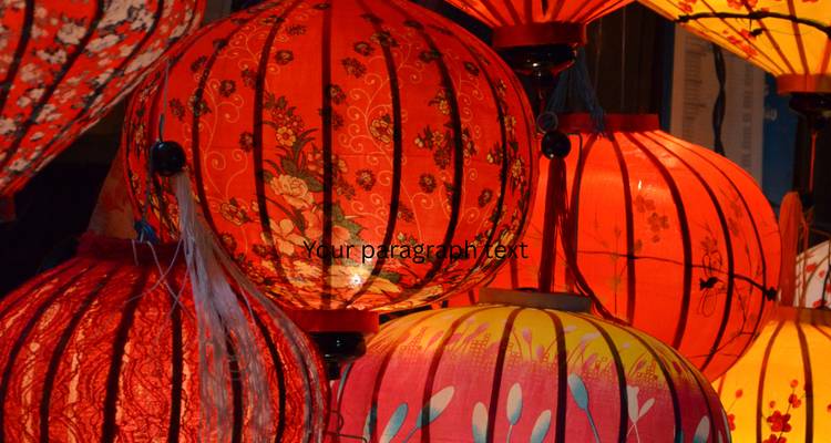 Close-up of red decorative lanterns with superimposed text across the image.