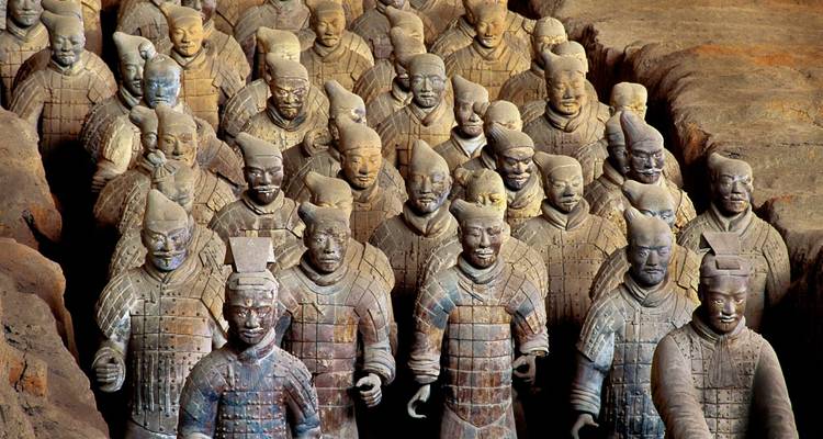 Close formation of Terracotta Warriors standing in excavation pits of Xi'an