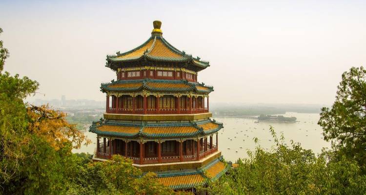 Elevated view of the multi-tiered Tower of Buddhist Incense at Beijing’s Summer Palace overlooking the vast Kunming Lake.