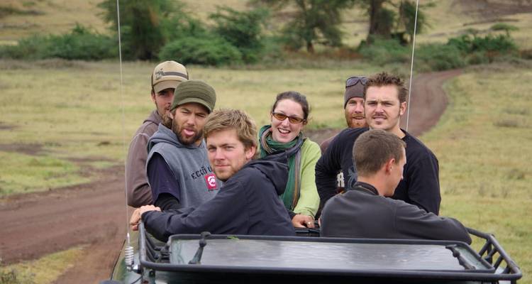 Group on a safari ride in an open vehicle.
