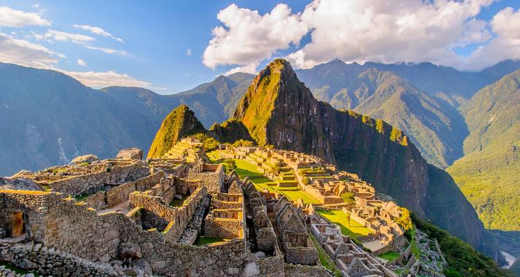 Iconic view of Machu Picchu ruins with a clear sky.