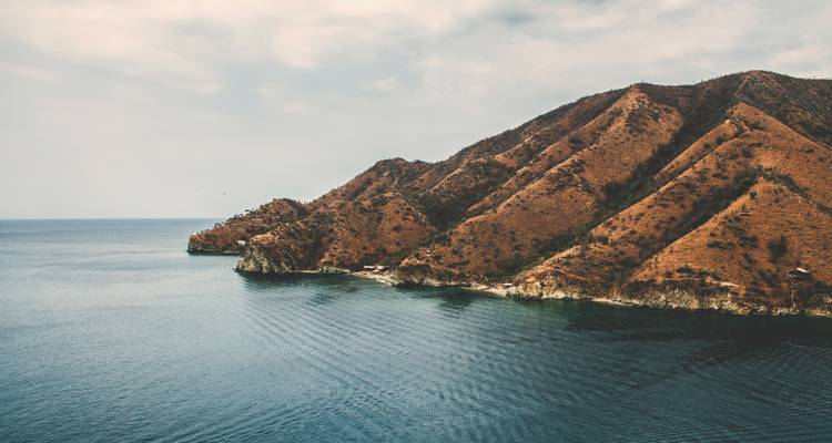 Mountainous coastline with a rugged shoreline.